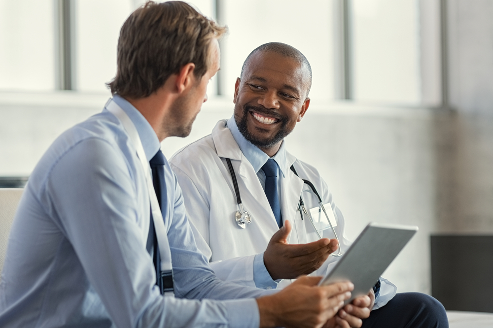 Two doctors are discussing the patient's diagnosis.